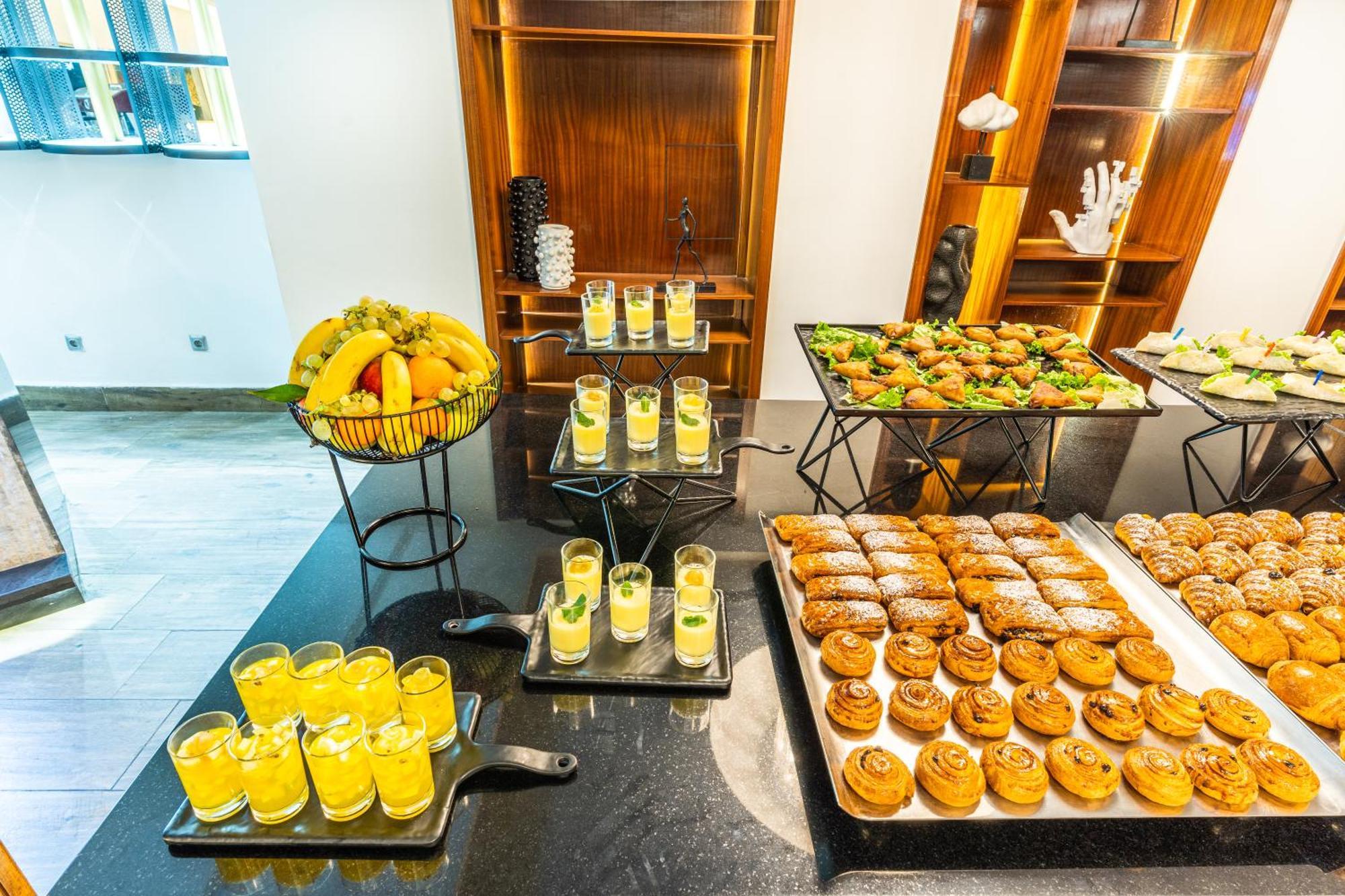 One Hotel Casablanca Kültér fotó A selection of desserts at a buffet