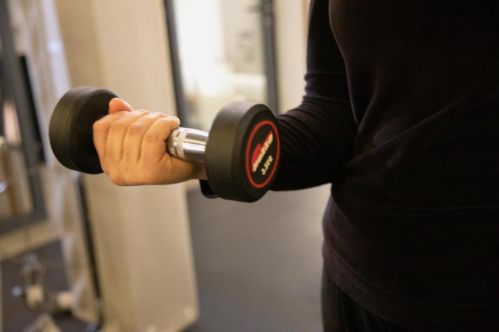 One Hotel Casablanca Kültér fotó A man lifting a dumbbell
